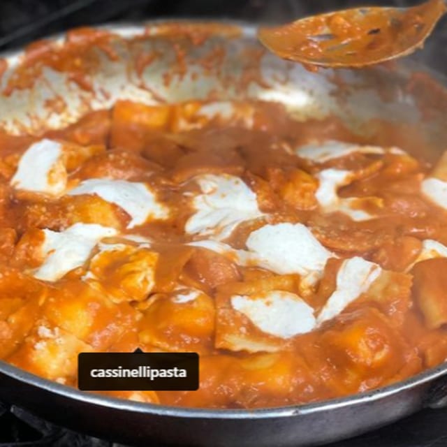 Family Dinner Special - Ravioli Alla Vodka Topped with Chicken Cutlet & Fresh Mozzarella.